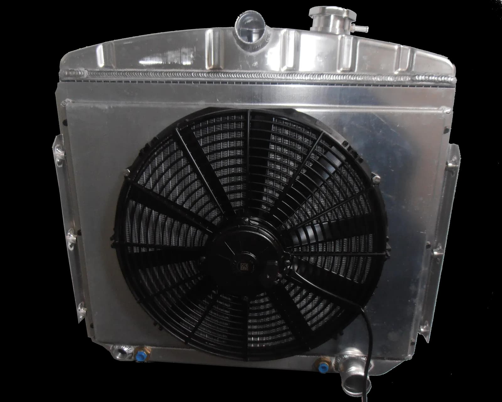 Aluminum radiator with fan for a Tri-5 Chevy