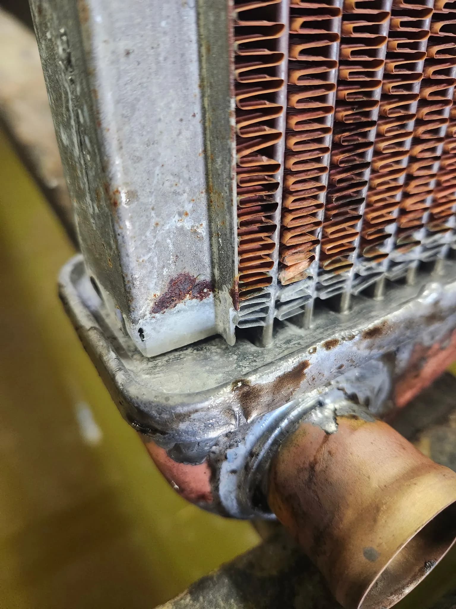 Corroded radiator core and outlet neck