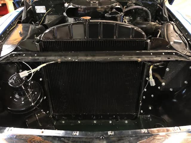 Black copper radiator installed in a classic car