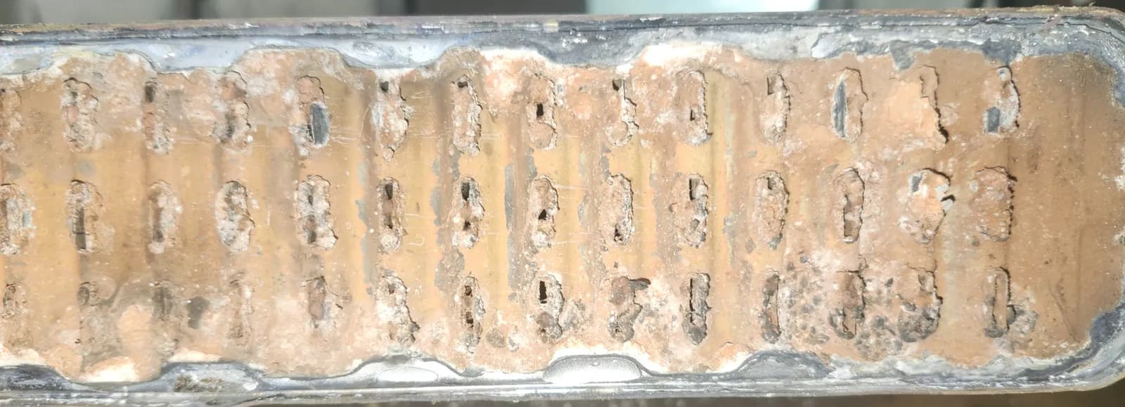 Radiator tubes packed with rust and scale