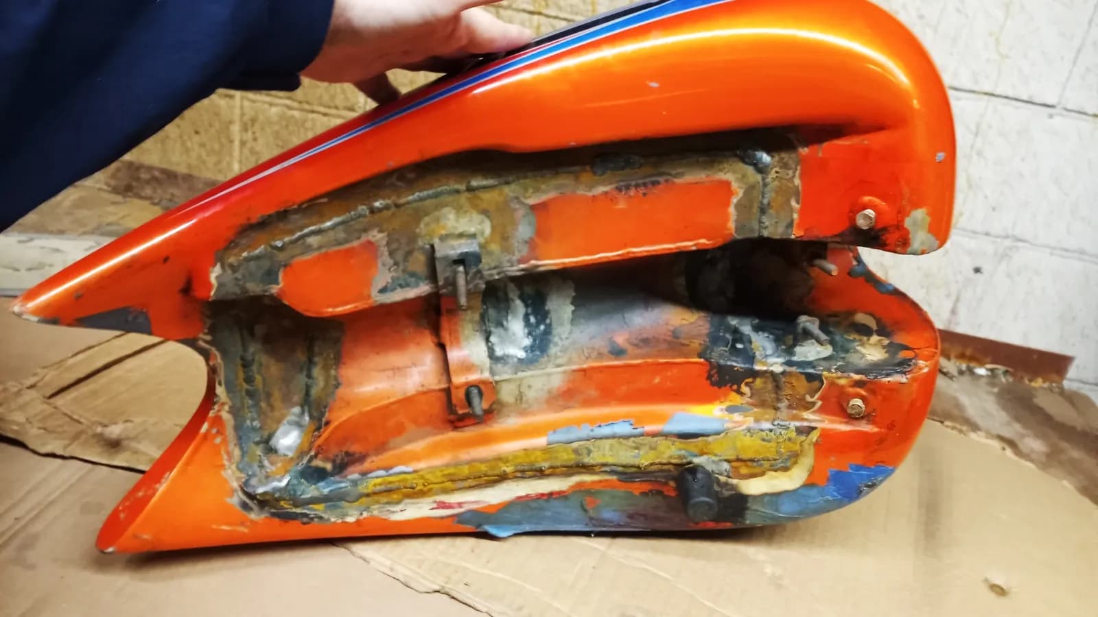 Clean bike tank welded back together, ready to coat inside