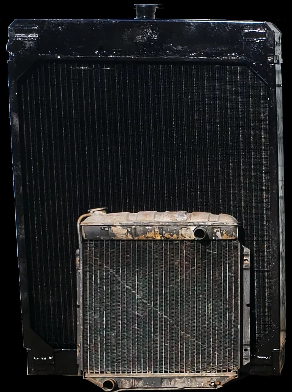 Sterling radiator towering over a Ford Mustang radiator